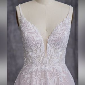 Brand new size 20 “Keisha” Wedding gown by Maggie Sottero.